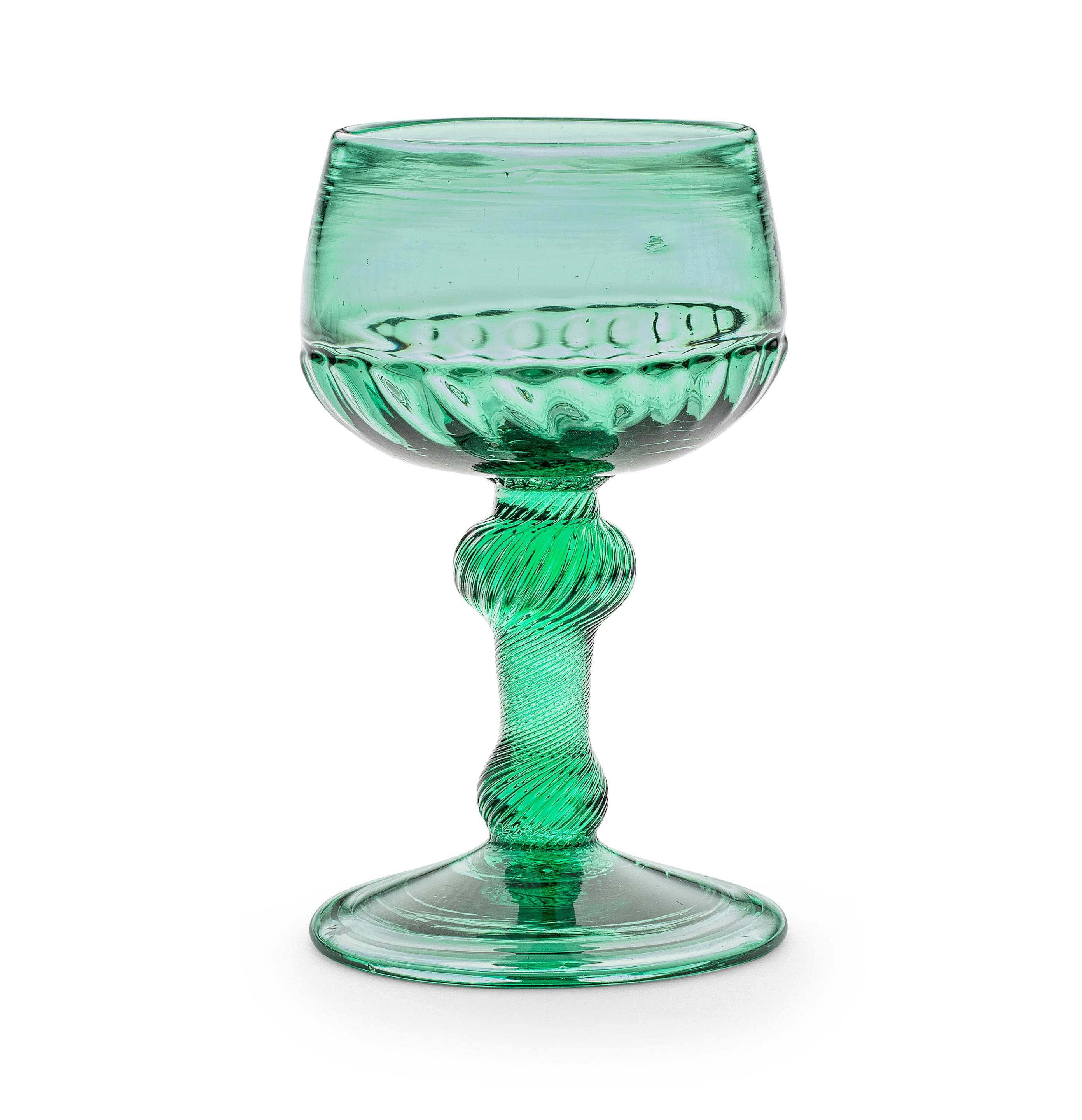 A rare green tinted incised twist baluster champagne or wine glass, circa 1750-60