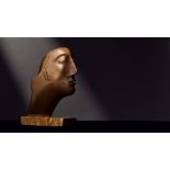 Henry Moore O.M., C.H. (British, 1898-1986) Head 17.7 cm. (7 in.) high (including the marble bas