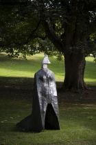 Lynn Chadwick R.A. (British, 1914-2003) Cloaked Figure IX 185 cm. (73 in.) high (Conceived and c...