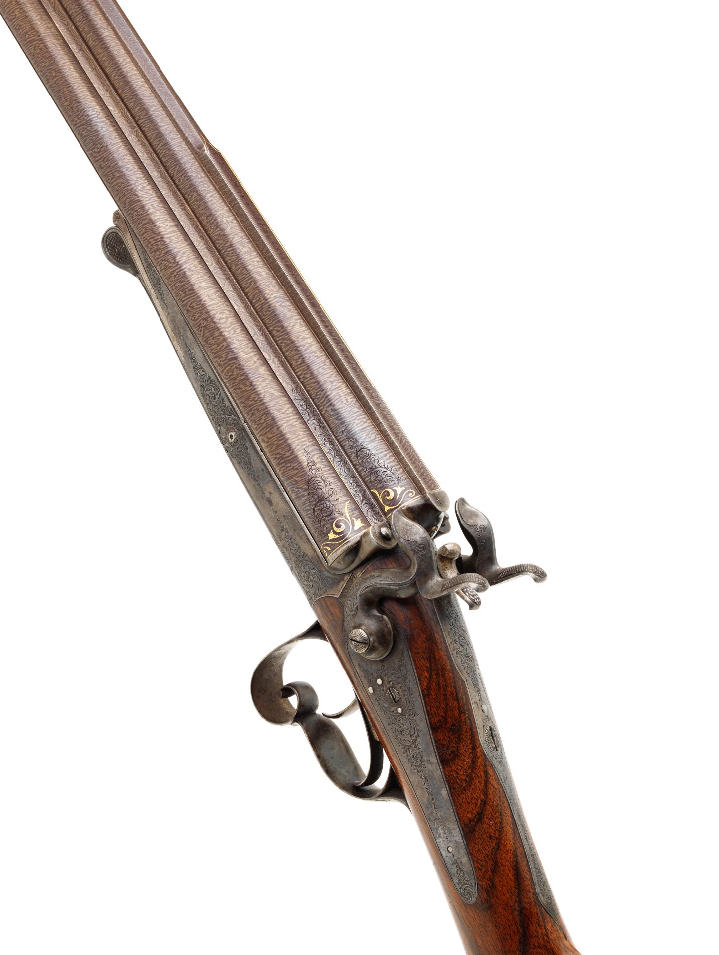 A rare three-barrelled 20-bore hammer gun by Laine, no. 3057