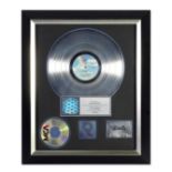 The Who: A 'Platinum' Sales Award Presented To John Entwistle For The Album Tommy, 1993,