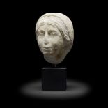 A marble head of an Italian woman Probably 15th Century