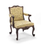 A George II walnut armchair 1750-1755, either made by the firm of Wright and Elwick or executed ...