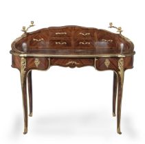 A French late 19th century ormolu mounted kingwood and bois satine bonheur du jour in the Louis ...