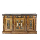 An important early Victorian 'Antiquarian' walnut and ebonised breakfront low cabinet mounted