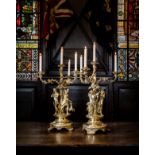 A monumental pair of George IV silver-gilt four-light candelabra Benjamin Smith II, London 1827