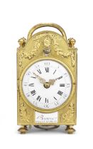 An interesting late 18th century French gilt brass travel clock with rotating annular calendar dials