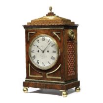 A late 19th century brass bound mahogany table clock with rare shaped plates Haines and H. Knight