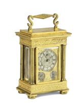 A good mid 19th century English gilt and engraved brass travel timepiece with calendar and running s