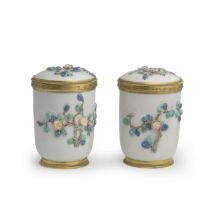 An extremely rare pair of gilt-bronze-mounted Chantilly tobacco jars and covers, circa 1740