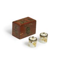A pair of Saint-Cloud silver-gilt-mounted miniature tobacco jars and covers in a red lacquer tr...