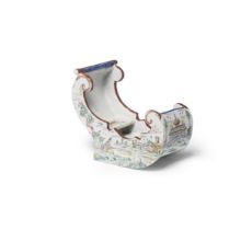 A rare Dutch Delft polychrome pipe modelled as a sleigh, circa 1750