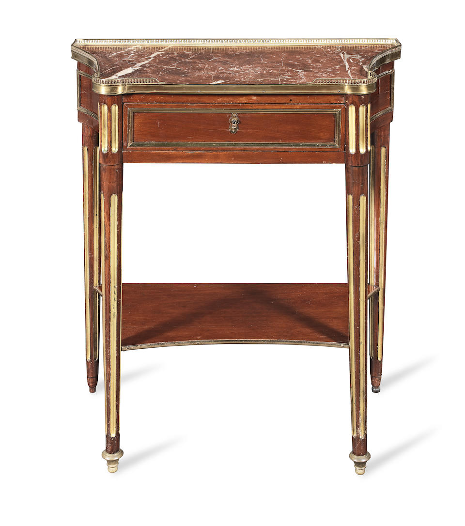 A small French late 19th century brass mounted mahogany and parcel gilt console desserte in the ...