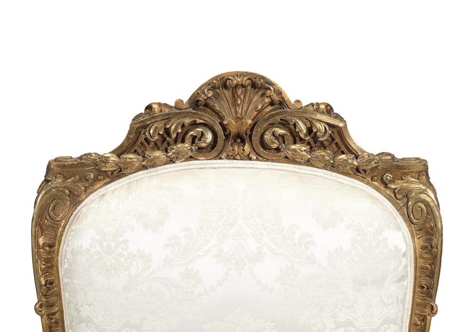 A pair of French late 19th/early 20th century giltwood fauteuils a la Reine in the Regence style... - Image 2 of 2