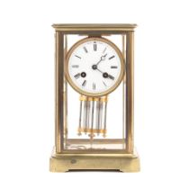 An early 20th French brass four glass mantel clock the movement stamped Hy Marc, Paris