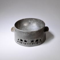 ARCHIBALD KNOX (BRITISH, 1864-1933) FOR LIBERTY & CO. Unusual 'Tudric' dog bowl, no. 0317, circa...