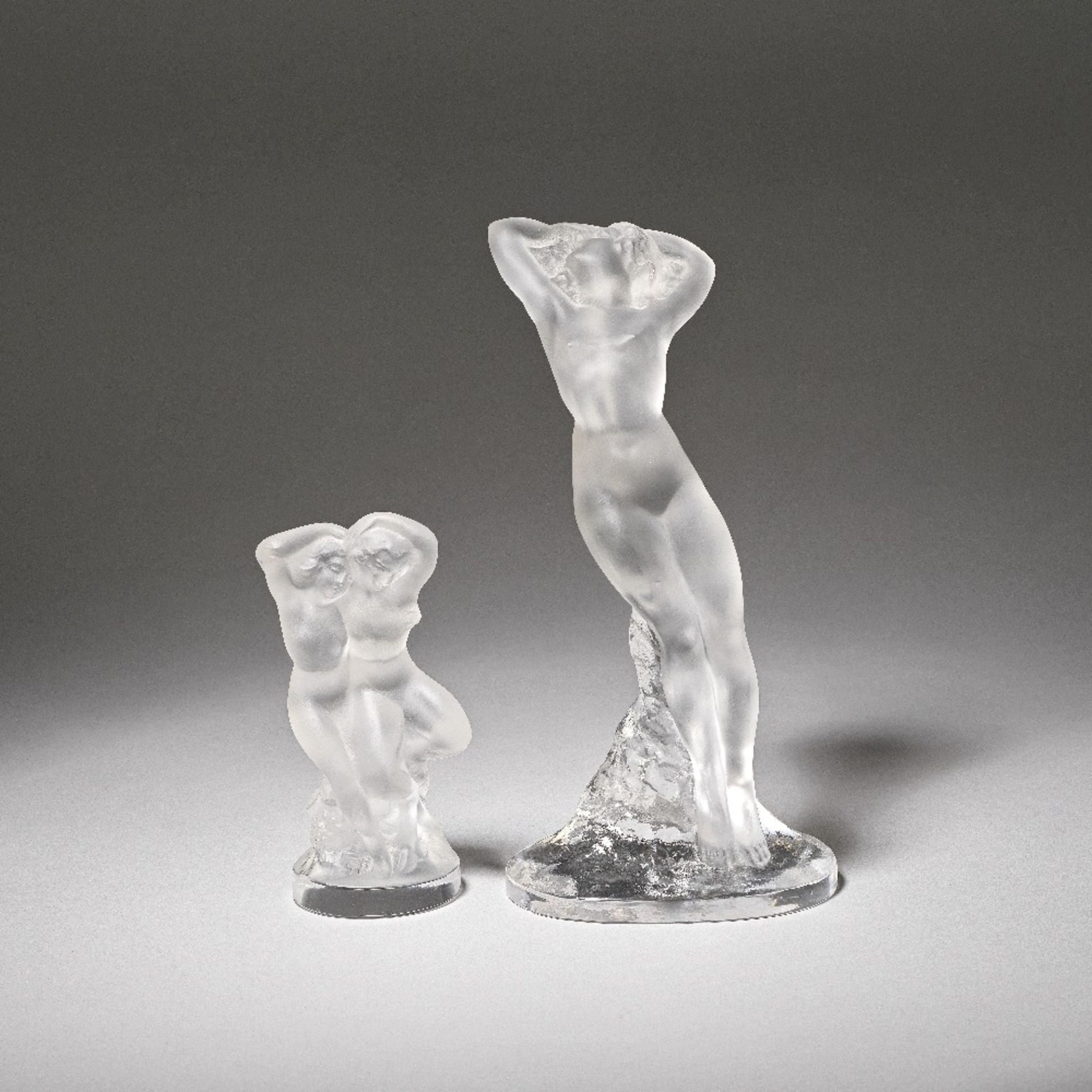 REN&#201; LALIQUE (FRENCH, 1860-1945) Two statuettes, early 21st century