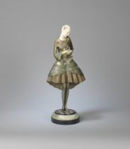 ATTRIBUTED TO PAUL PHILLIPE Lady in a flared dress, circa 1930