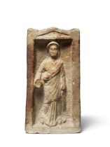 A Late Hellenistic or Early Roman marble funerary stele for a woman