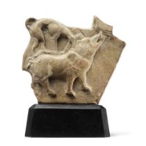 A Boeotian terracotta relief fragment of a boar hunt