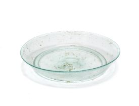 A Roman pale blue-green glass dish