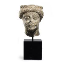 A Cypriot limestone male head