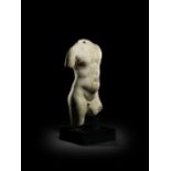 A Roman marble torso of Eros