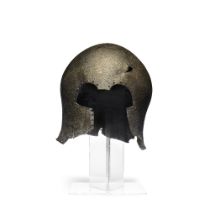 A Greek bronze Corinthian helmet with inscriptions