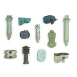 Eleven Egyptian glazed faience amulets of protective symbols 11