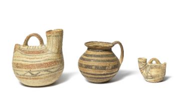 Two Daunian askoi and a Daunian handled jar 3