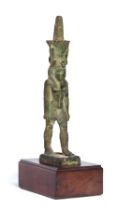 An Egyptian bronze striding Nefertum