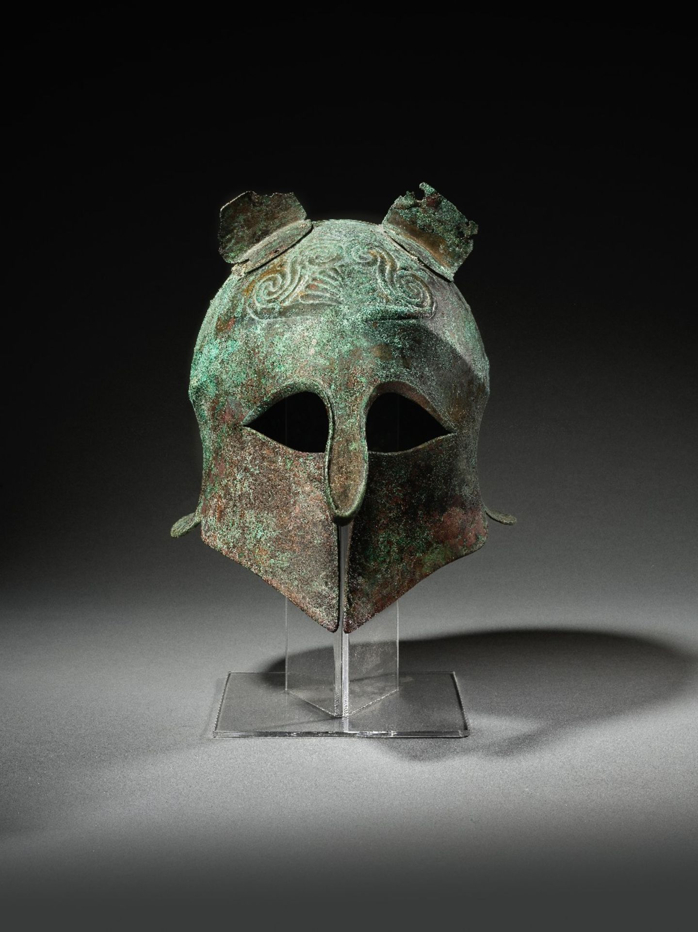 A Greek bronze Corinthian helmet