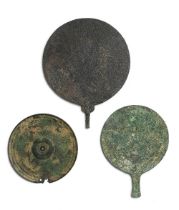 A Greek bronze mirror and two Roman bronze mirrors 3