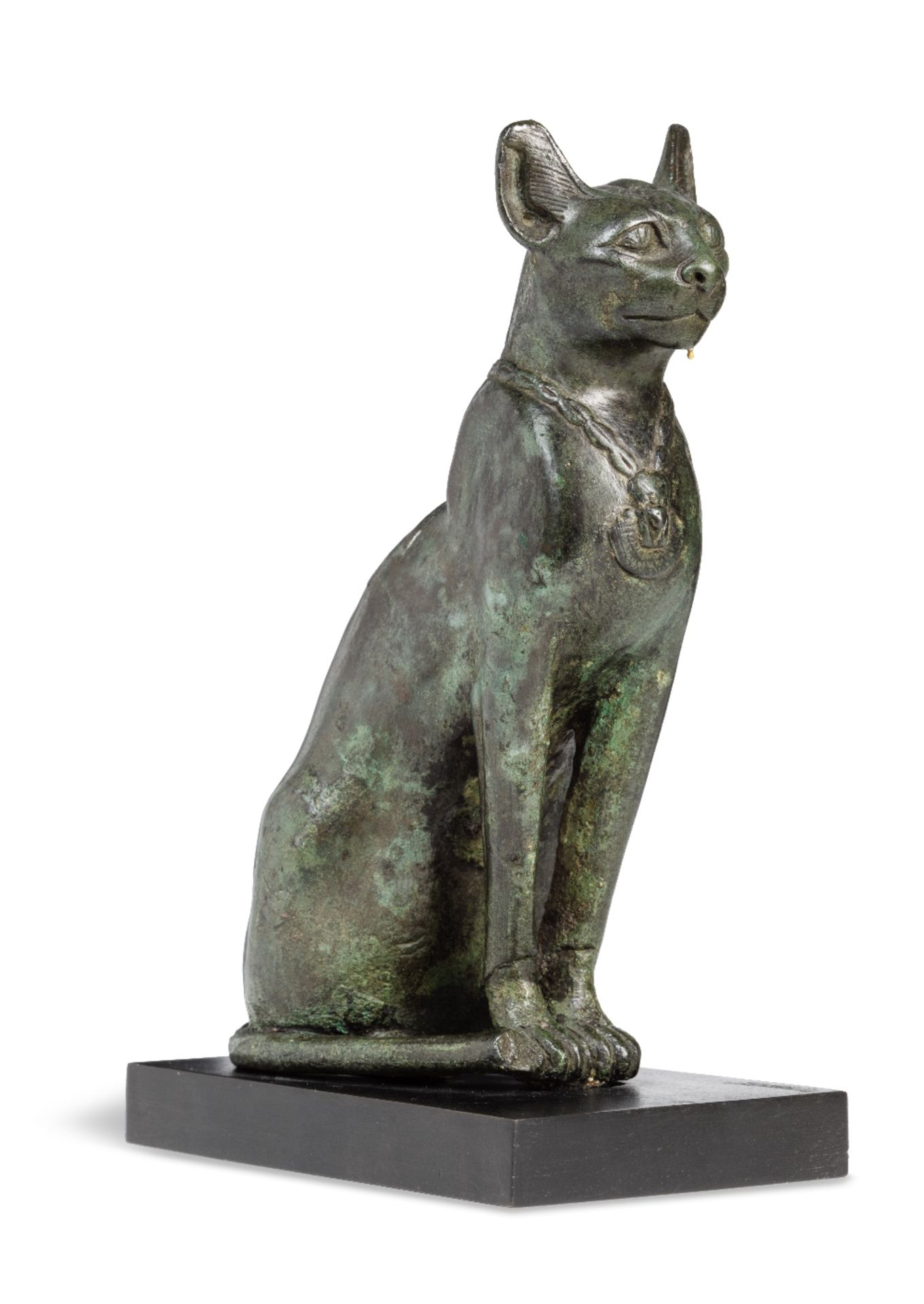 An Egyptian bronze seated cat