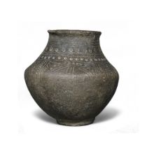 An Anglo-Saxon burnished brown pottery urn