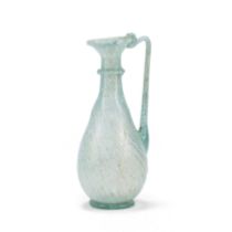 A Roman pale turquoise glass juglet