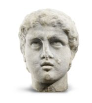 A Roman marble head of a male youth, possibly Hercules