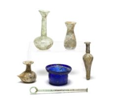 A group of five Roman glass vessels and a glass stirring rod 6