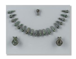 A group of Greek bronze openwork pendants 21