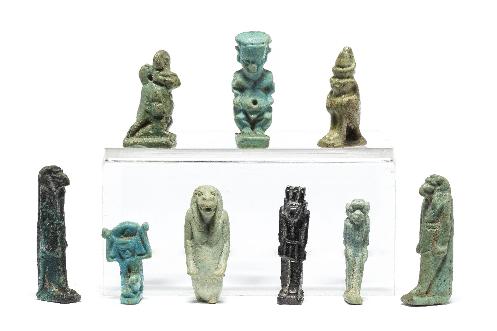 Nine Egyptian glazed faience amulets of gods and animals 9
