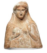 A large Rhodian terracotta female protome