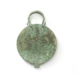 A Roman bronze hinged mirror