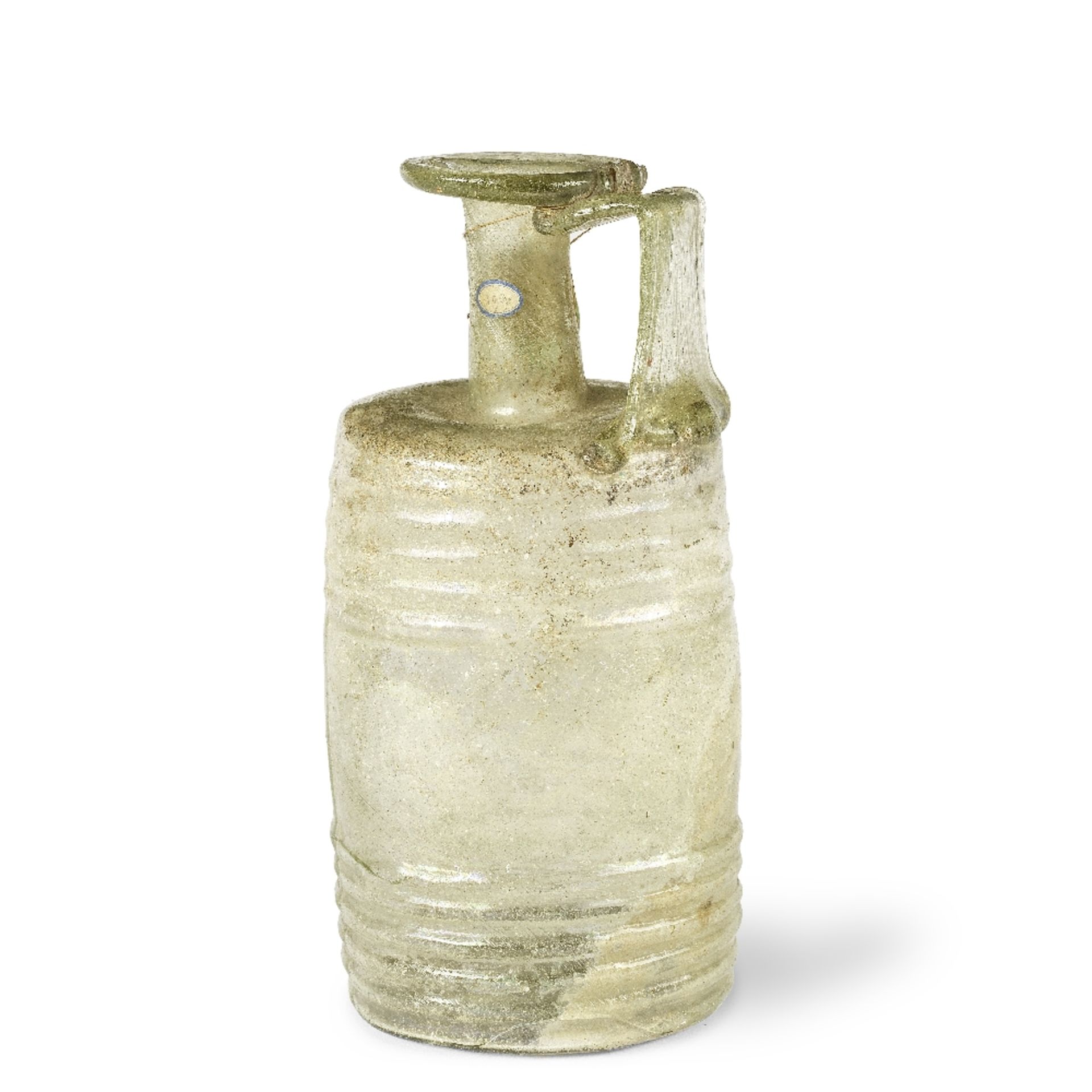 A Gallo-Roman cylindrical ribbed pale green glass handled bottle signed by Frontinus