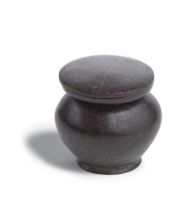 An Egyptian brown serpentine three-part kohl jar