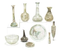 Nine Roman glass bottles and bowls and a Roman glass base fragment 10