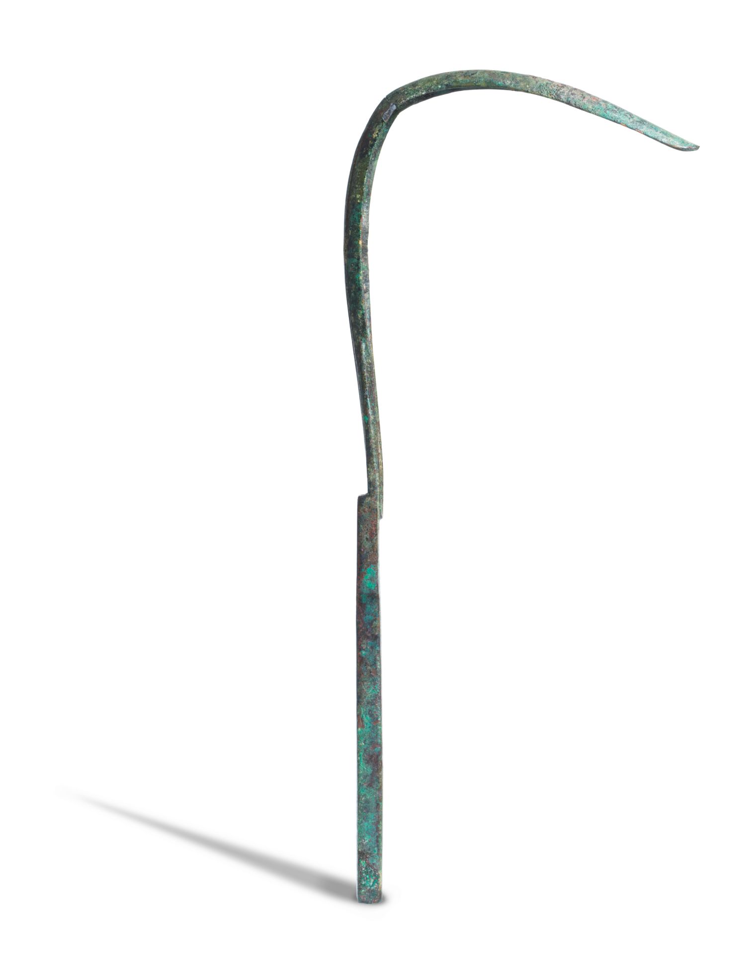 A Roman bronze strigil
