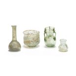 A group of four Roman green glass vessels 4