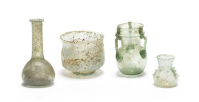 A group of four Roman green glass vessels 4