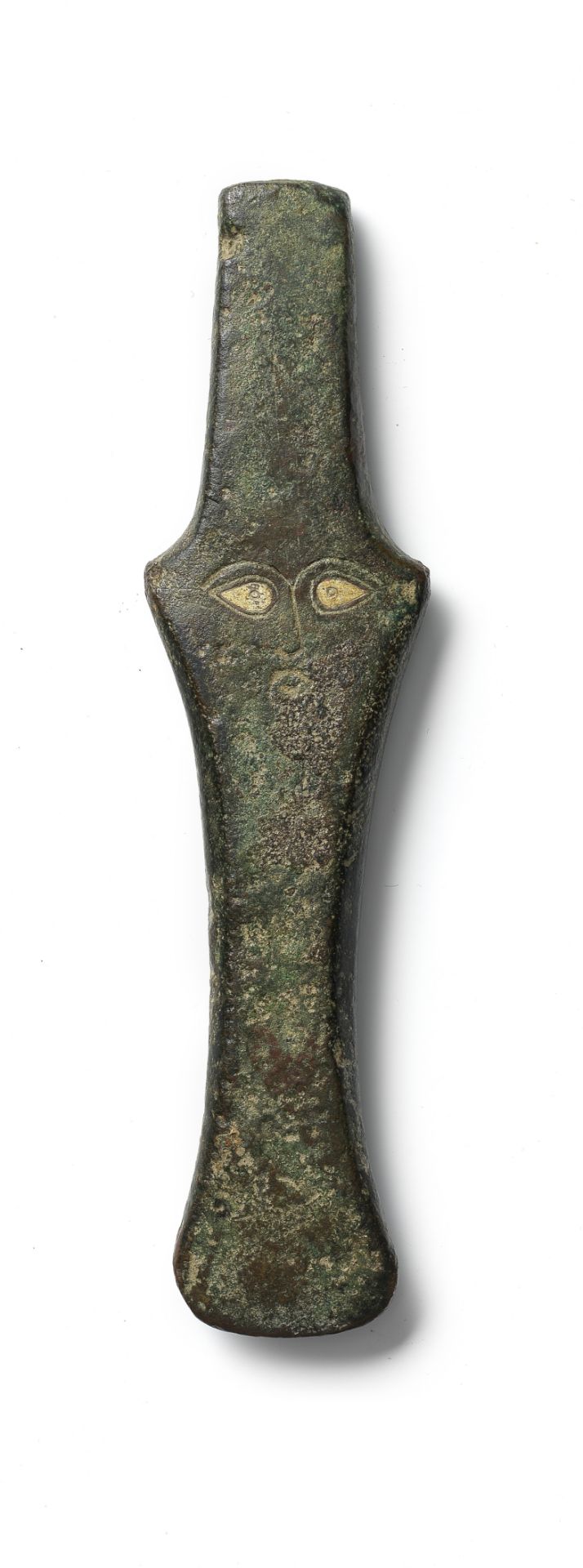 A Near Eastern bronze lugged anthropomorphic axe head with inlaid eyes