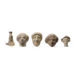 Three Greek terracotta female protome heads, a Boeotian fragmentary bust, and a Tarrentine head ...
